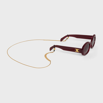 TRIOMPHE SUNGLASSES CHAIN IN BRASS WITH GOLD FINISH AND PLASTIC GOLD